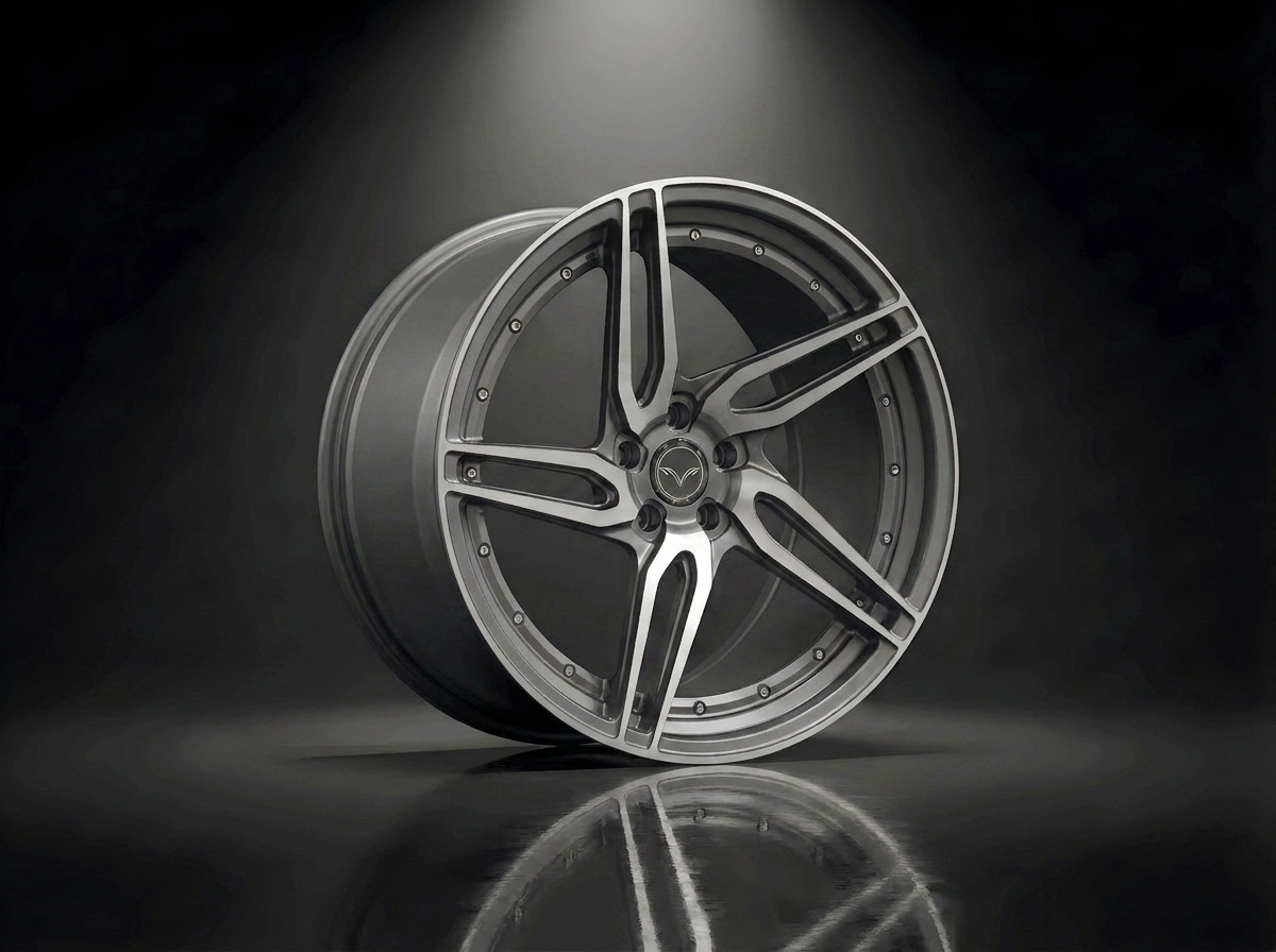 MONERO 10NE-XVII forged wheel in brushed titanium with a machined face, cool grey multi-spoke profile