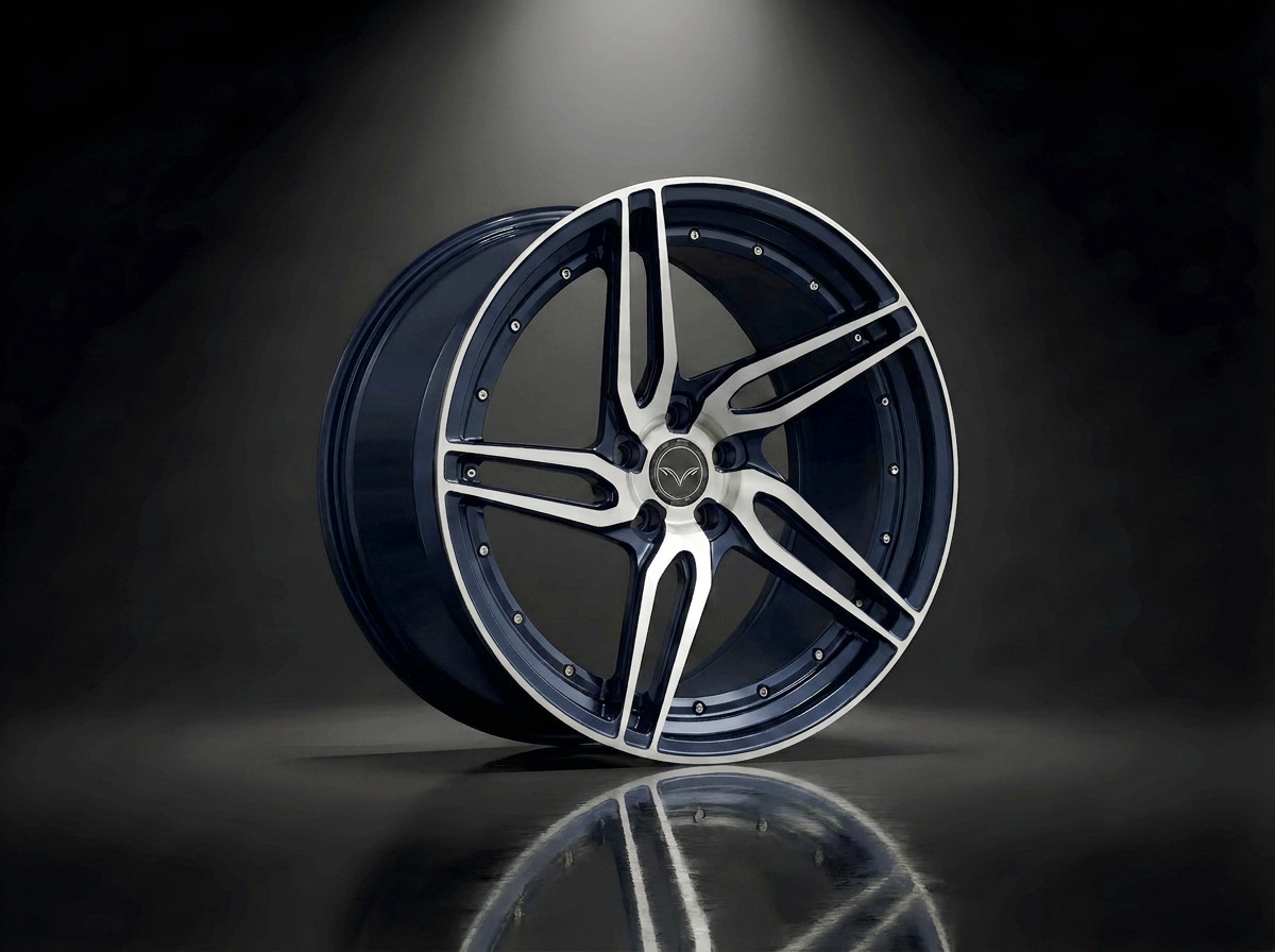 MONERO 10NE-XVII forged wheel in midnight blue with a machined face, deep-concave multi-spoke profile